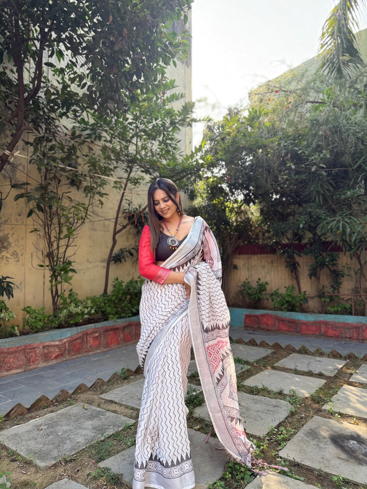 Elegant White Pure Linen Digital Printed Saree with Chevron Design and Intricate Red-Black Geometric Pallu – Tassel Details and Matching Blouse Piece