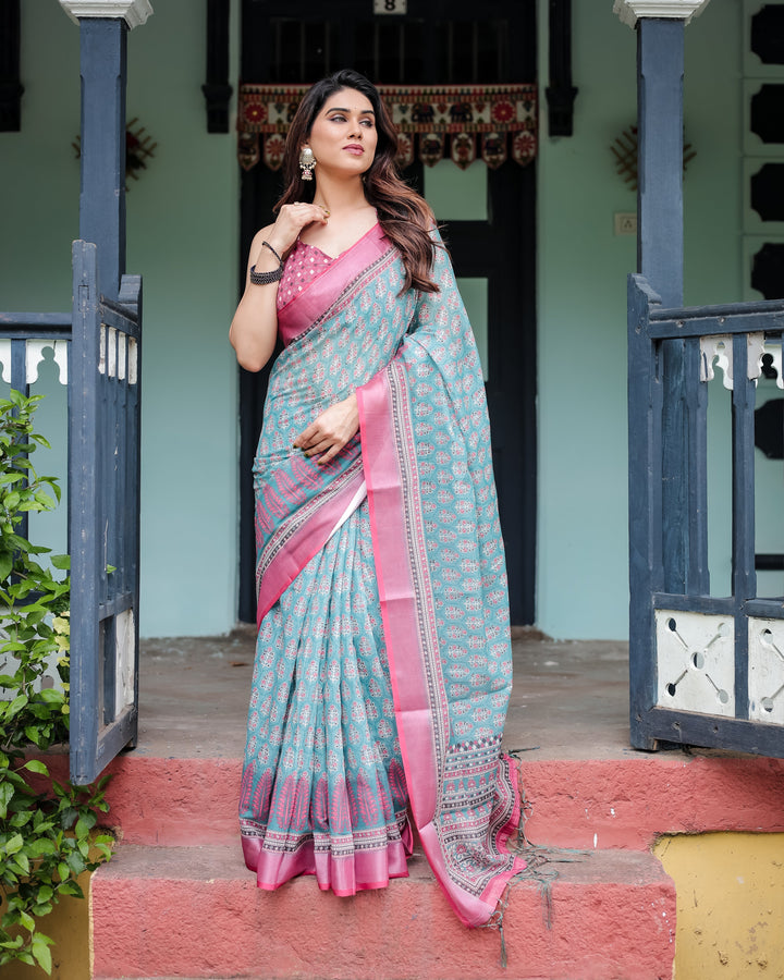 Aqua Blue Pure Cotton Linen Saree with Pink Border, Floral Motifs, and Tassel Detailing