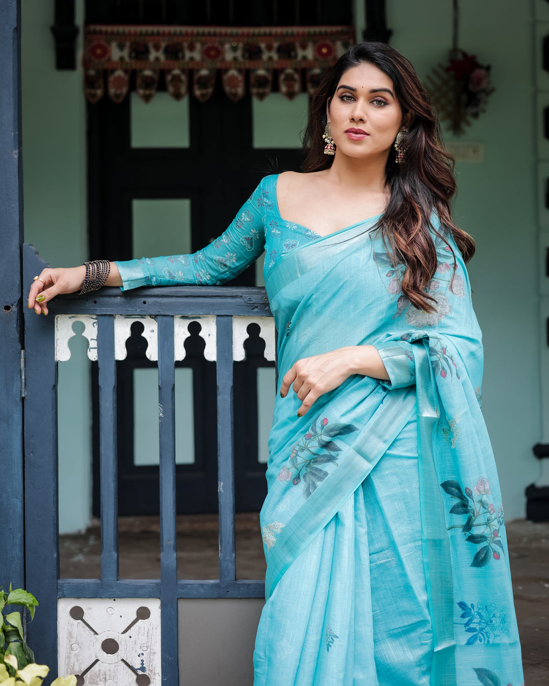 Aqua Blue Pure Cotton Linen Saree with Floral Design, Blouse, and Tassel Detailing