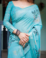 Aqua Blue Pure Cotton Linen Saree with Floral Design, Blouse, and Tassel Detailing