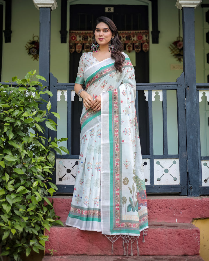 Ivory Pure Cotton Linen Saree with Elephant Motif and Floral Pattern, Green and Pink Borders, and Tassels on Edges.