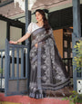 Black and White Pure Cotton Linen Saree with Intricate Floral Design and Tassels on Edges