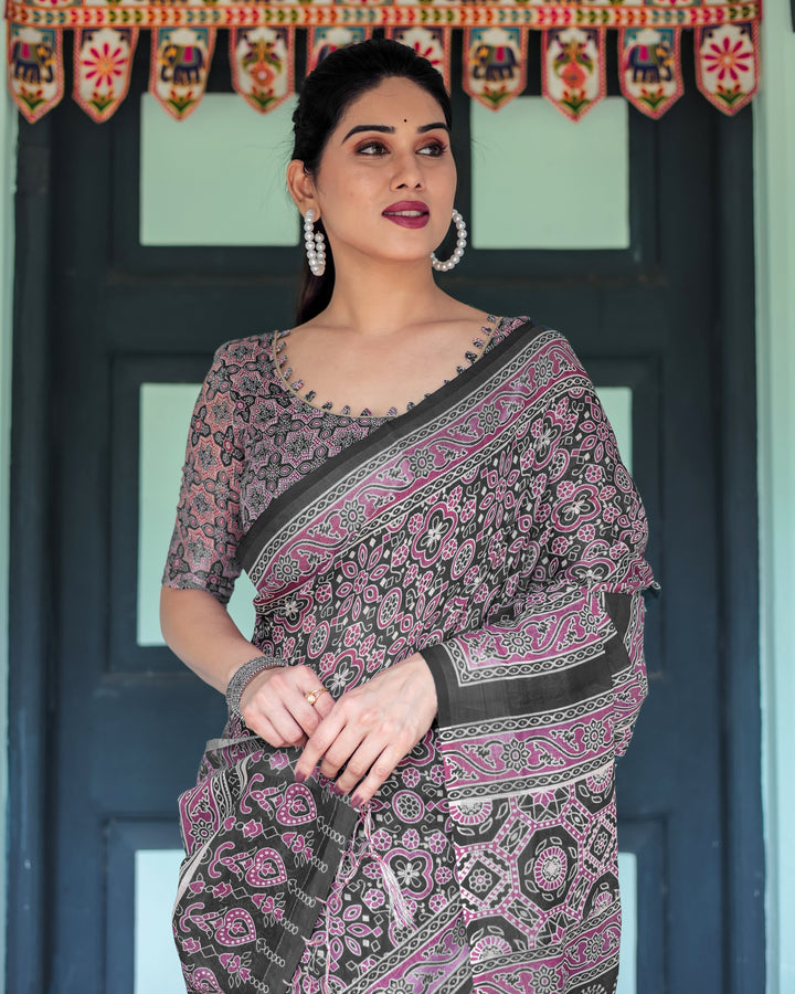 Black Pure Cotton Linen Saree with Pink Striped Pallu and Tassel Accents