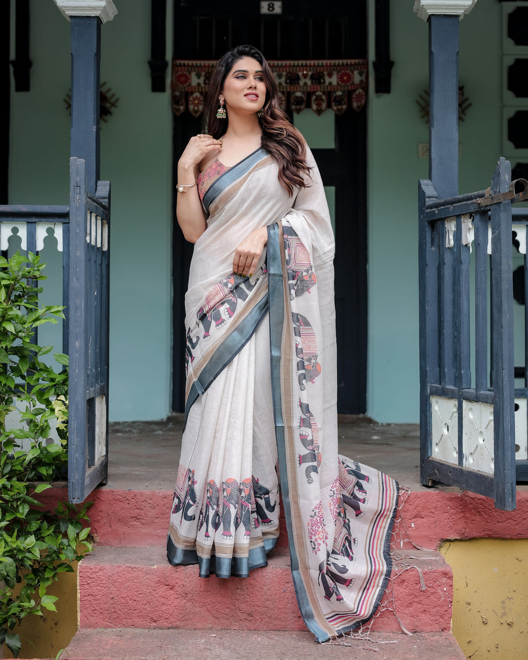 Ivory Pure Cotton Linen Saree with Elephant Motif and Tassel Detailing