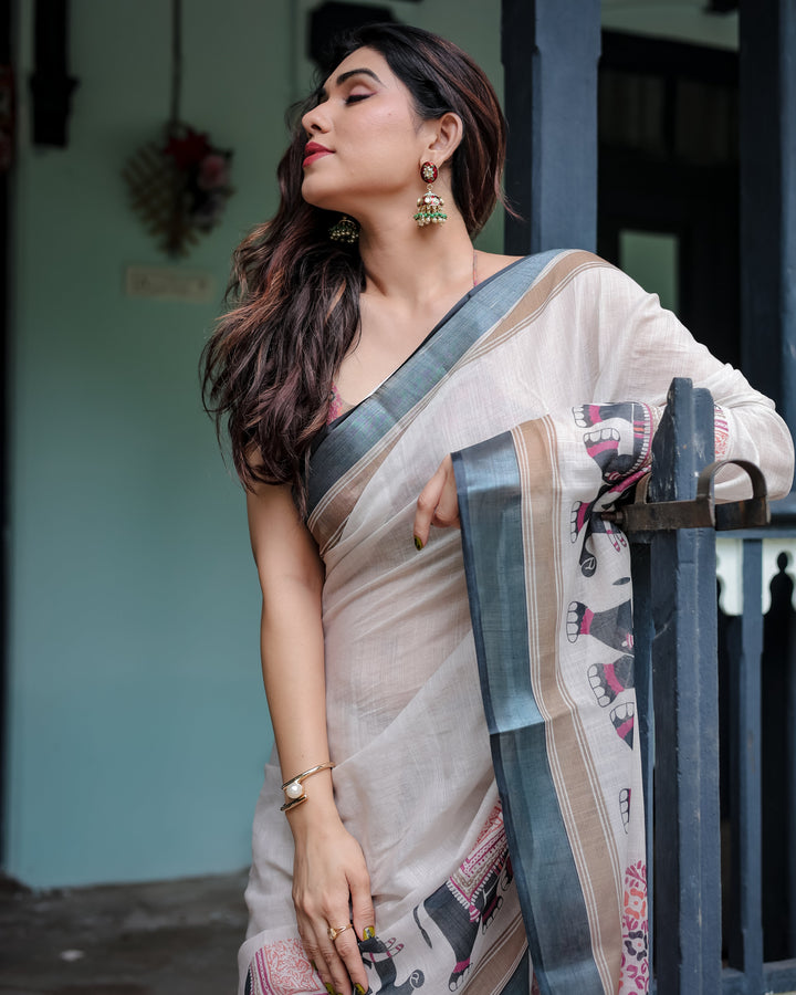 Ivory Pure Cotton Linen Saree with Elephant Motif and Tassel Detailing