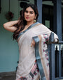 Ivory Pure Cotton Linen Saree with Elephant Motif and Tassel Detailing