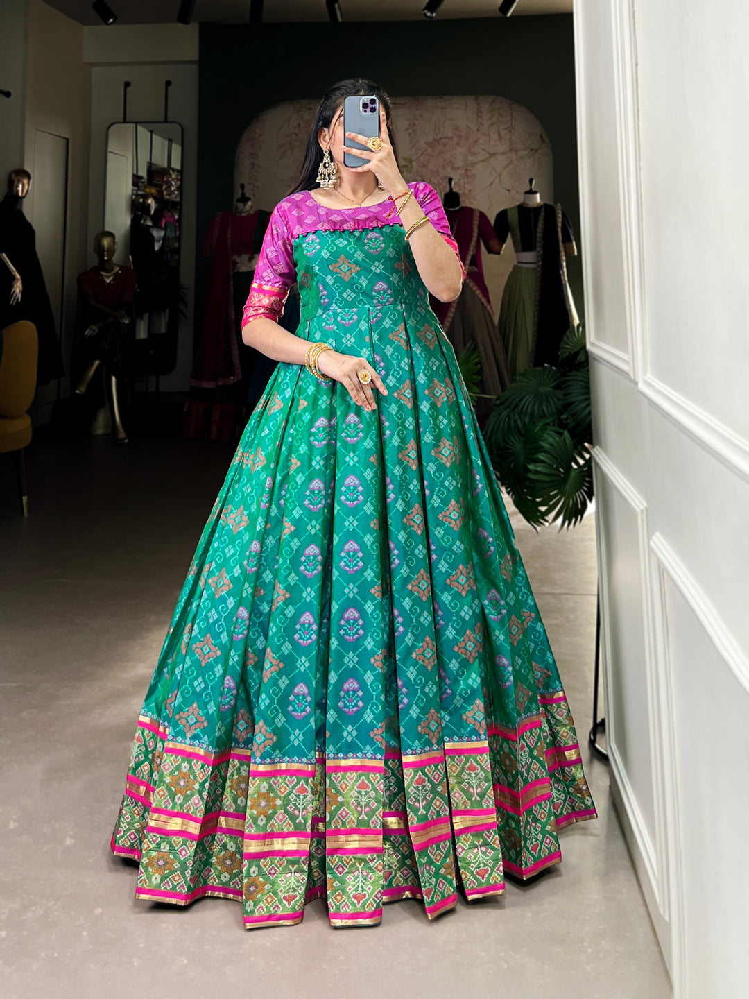 Turquoise Jacquard Silk Gown with Patola Print & Zari Weaving Work