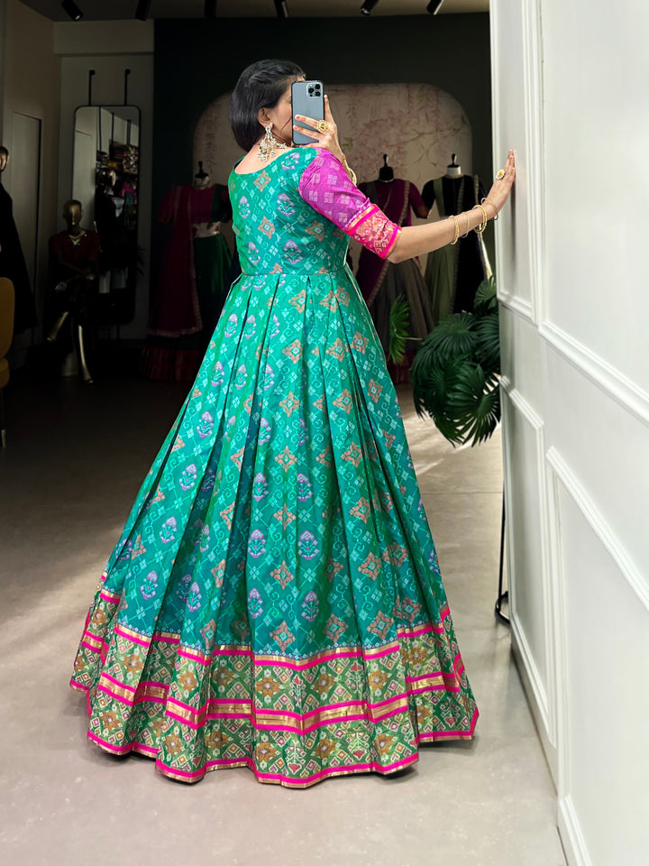 Turquoise Jacquard Silk Gown with Patola Print & Zari Weaving Work