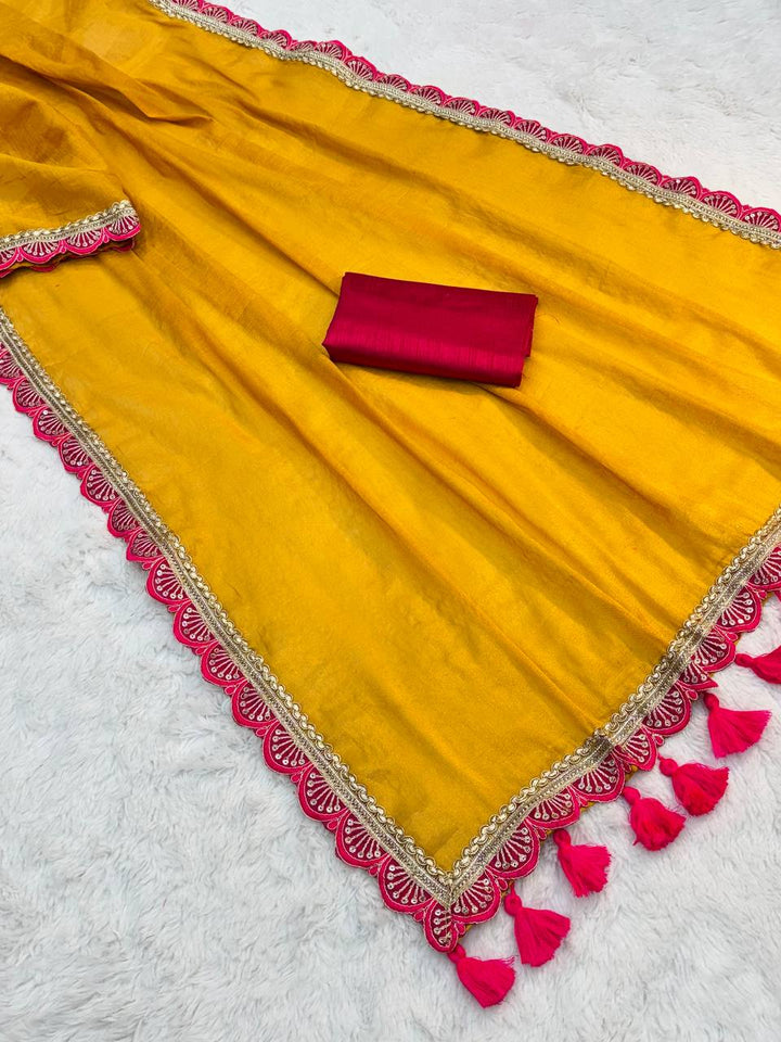 Golden Mustard Tissue Saree with Hot Pink Lace and Handmade Tassels