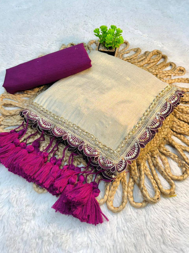 Golden Tissue Soft Saree with Penthar Lace and Purple Tassels