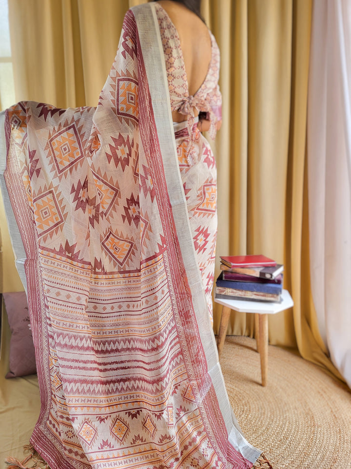 Ivory Linen Saree with Geometric Tribal Prints & Tassel Accents