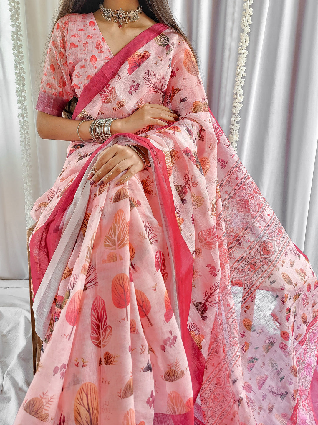 Blush Pink Handwoven Linen Saree with Vibrant Autumn Motifs & Tassel Detailing