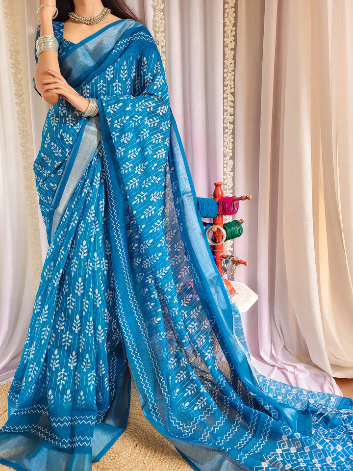 Elegant Blue Pure Linen Saree with Tassels and White Floral Patterns