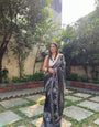 Black and White Pure Cotton Linen Saree with Intricate Floral Design and Tassels on Edges