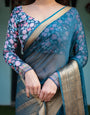 Teal Blue Plain Chiffon Saree with Gold Zari Border, Floral Printed Blouse & Tassel Detailing