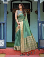 Mint Green Plain Chiffon Saree with Gold Zari Border, Geometric Printed Blouse & Tassel Detailing