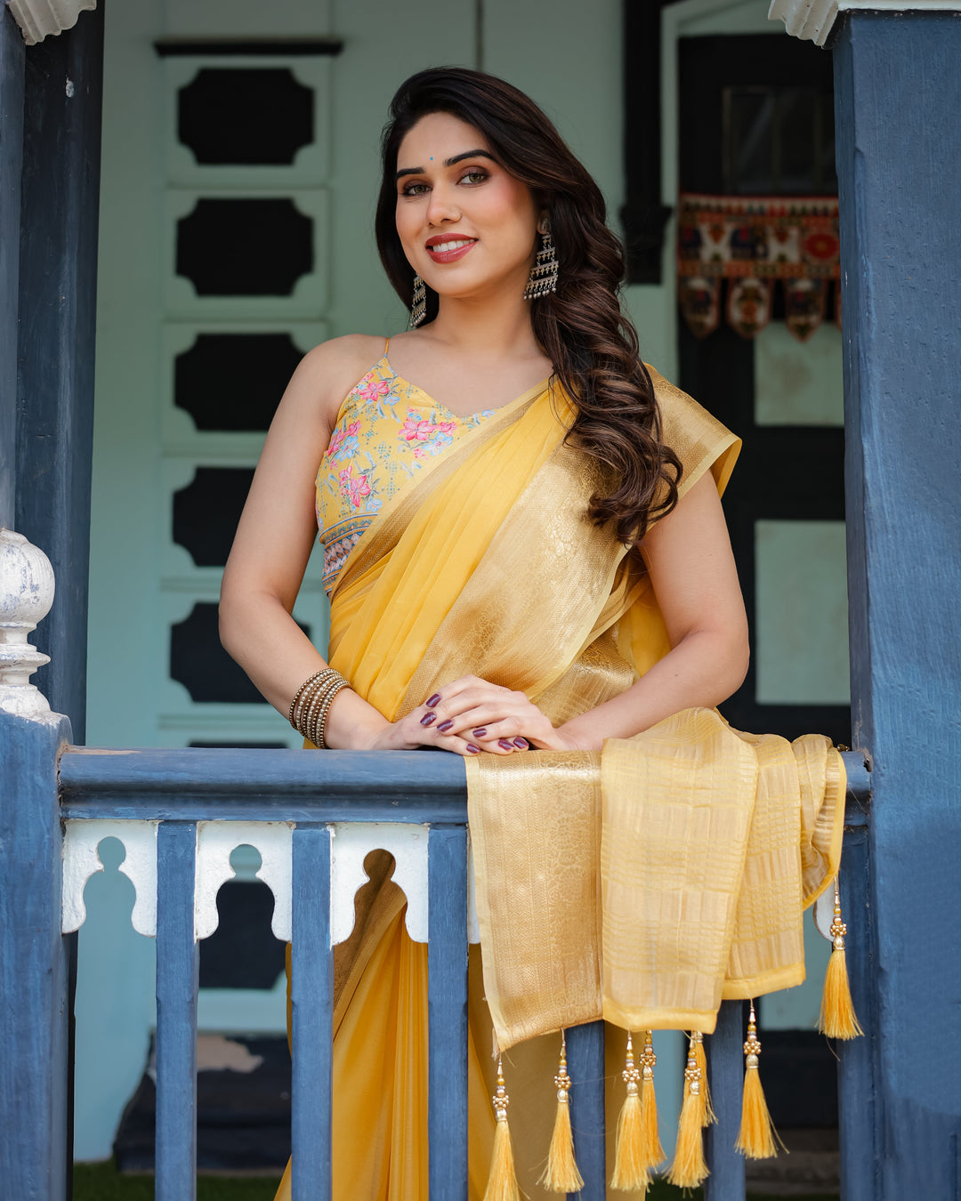 Golden Yellow Plain Chiffon Saree with Gold Zari Border, Floral Printed Blouse & Tassel Detailing