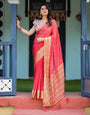 Vibrant Coral Pink Plain Chiffon Saree with Gold Zari Border, Floral Ruffled Blouse & Tassel Detailing