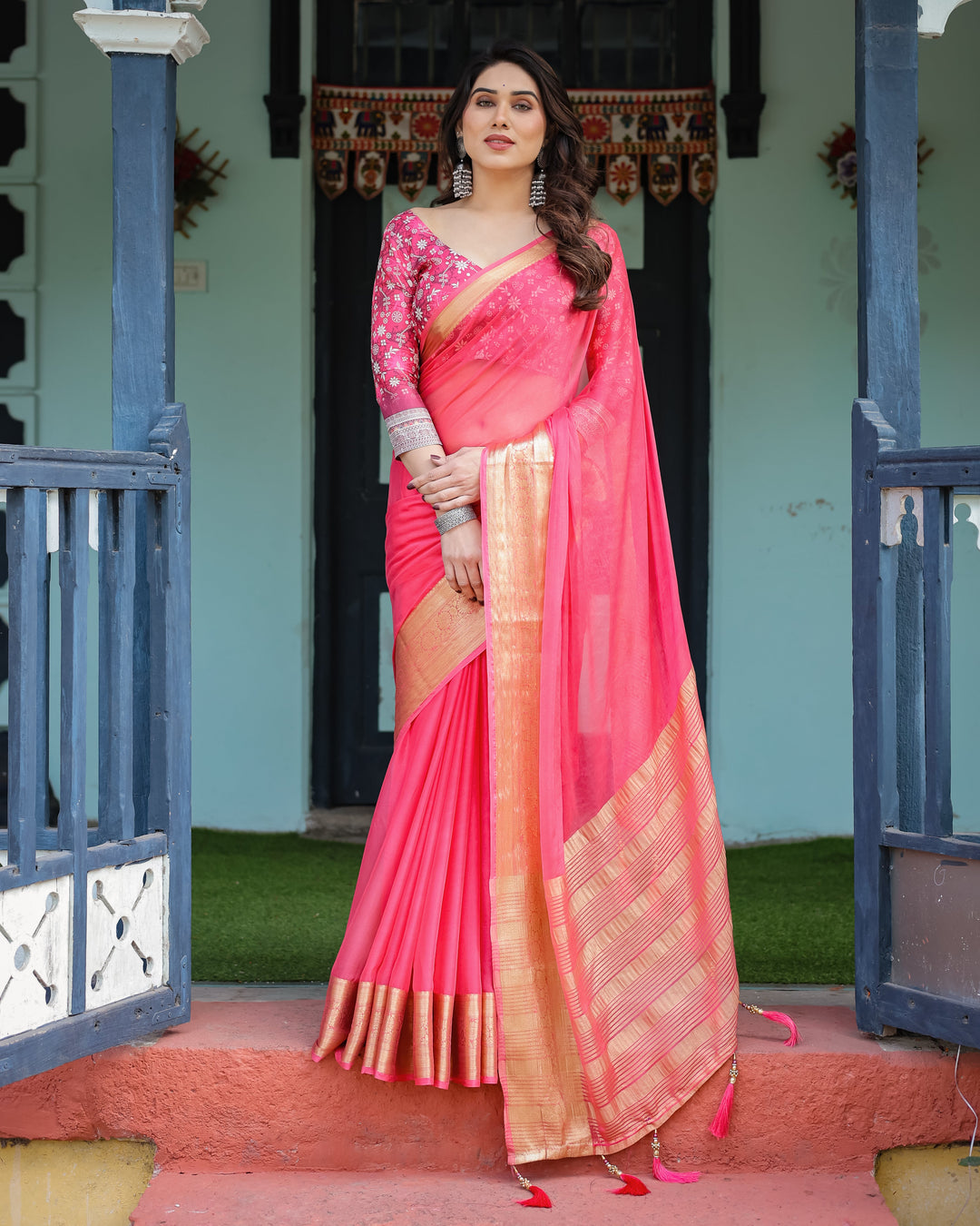 Ravishing Rani Pink Plain Chiffon Saree with Gold Zari Border, Floral Printed Blouse & Tassel Accents