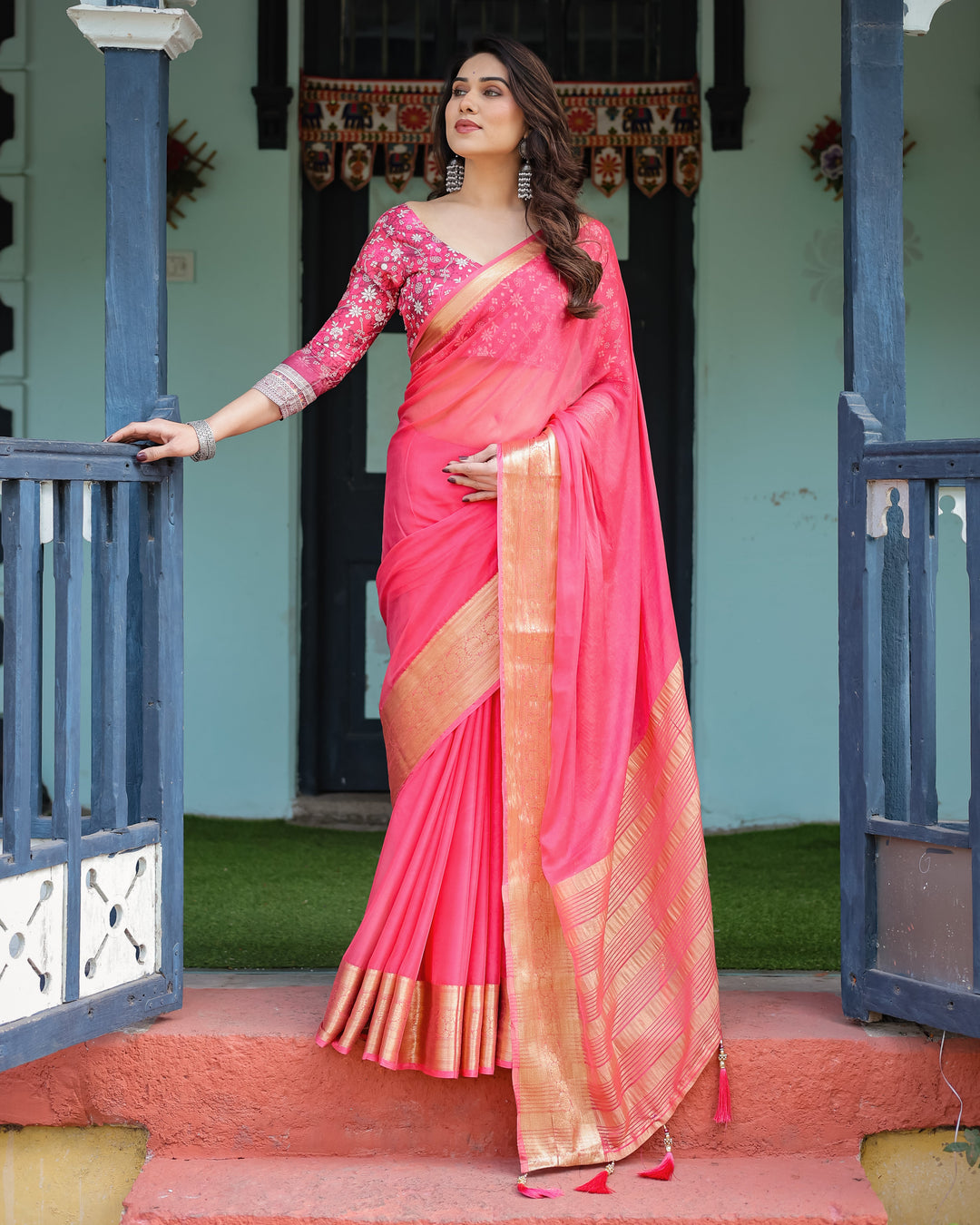 Ravishing Rani Pink Plain Chiffon Saree with Gold Zari Border, Floral Printed Blouse & Tassel Accents