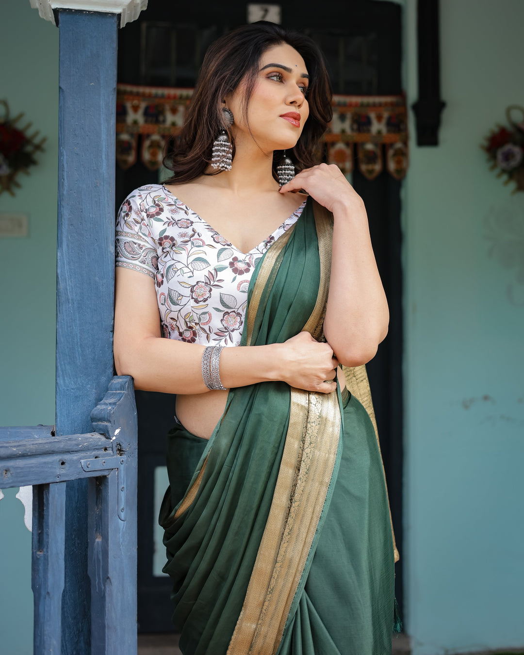 Elegant Bottle Green Plain Chiffon Saree with Gold Zari Border, Floral Printed Blouse & Tassel Finishing