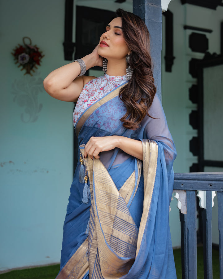 Serene Steel Blue Plain Chiffon Saree with Gold Zari Border, Floral Printed Blouse & Tassel Detailing