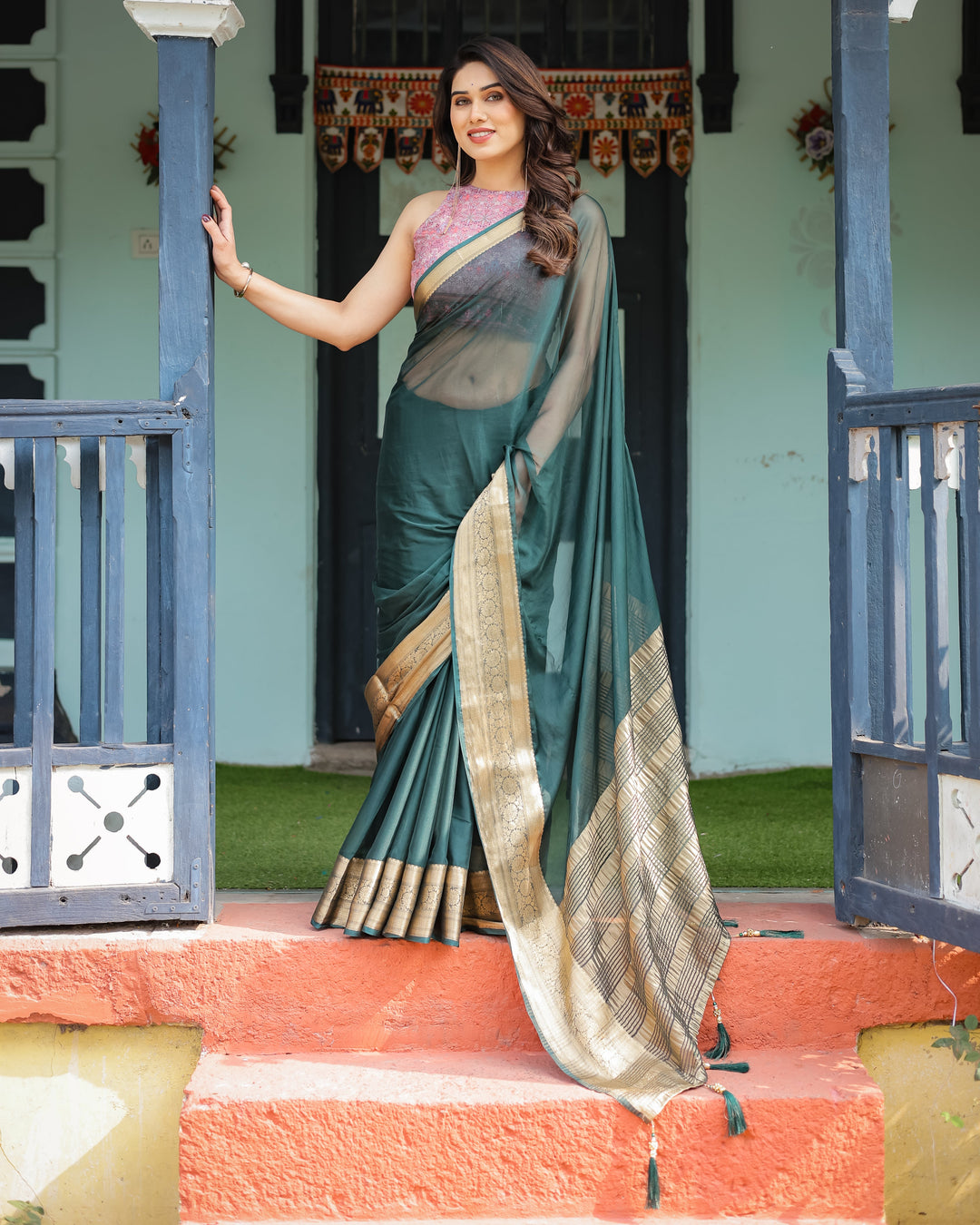 Enchanting Forest Green Plain Chiffon Saree with Gold Zari Border, Floral Printed Blouse & Tassel Details