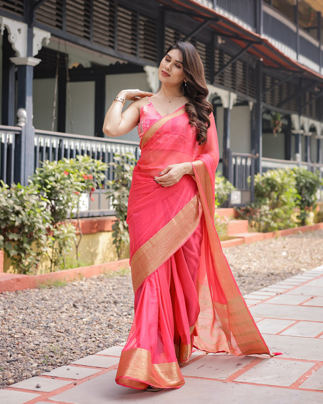 Flamingo Pink Plain Chiffon Saree with Gold Zari Border, Patterned Blouse & Tassel Detailing