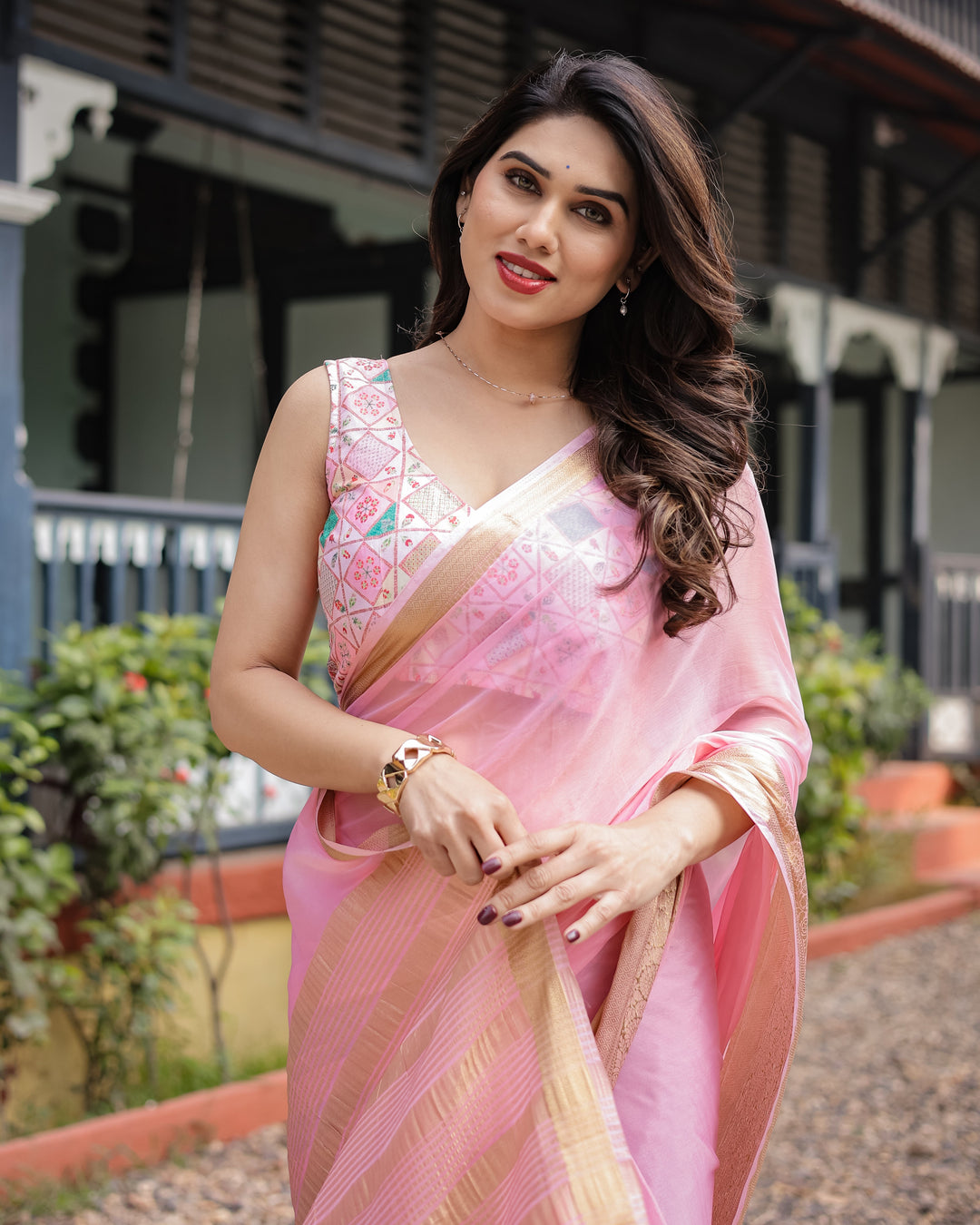 Soft Baby Pink Plain Chiffon Saree with Gold Zari Border, Geometric Embroidered Blouse & Tassel Detailing