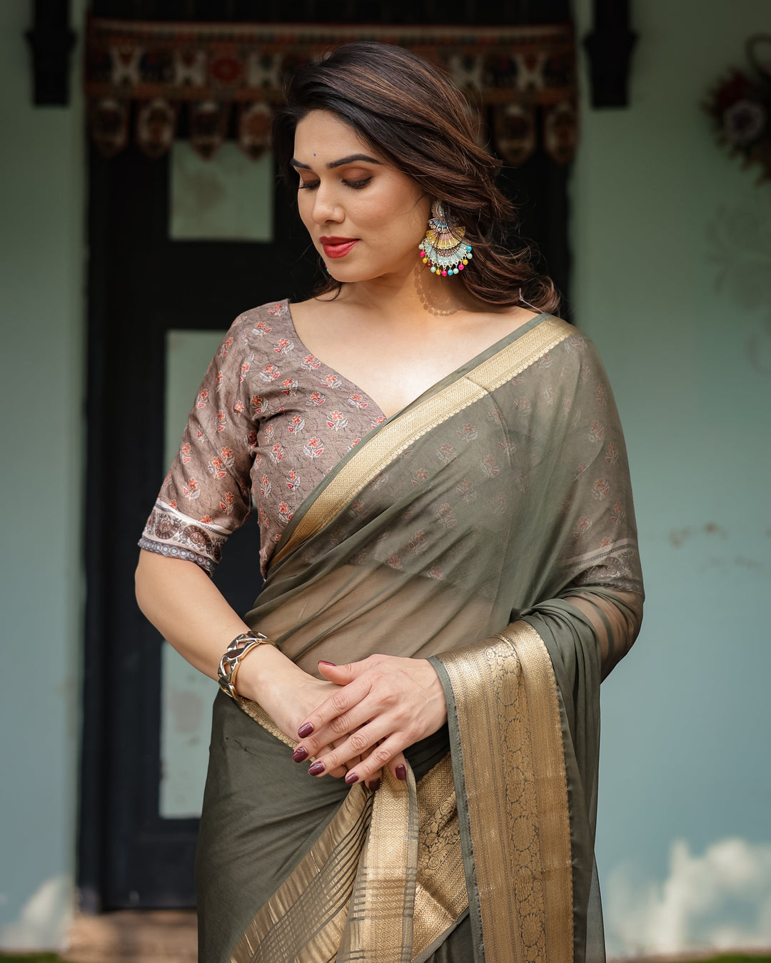 Elegant Olive Green Plain Chiffon Saree with Gold Zari Border, Floral Printed Blouse & Tassel Detailing