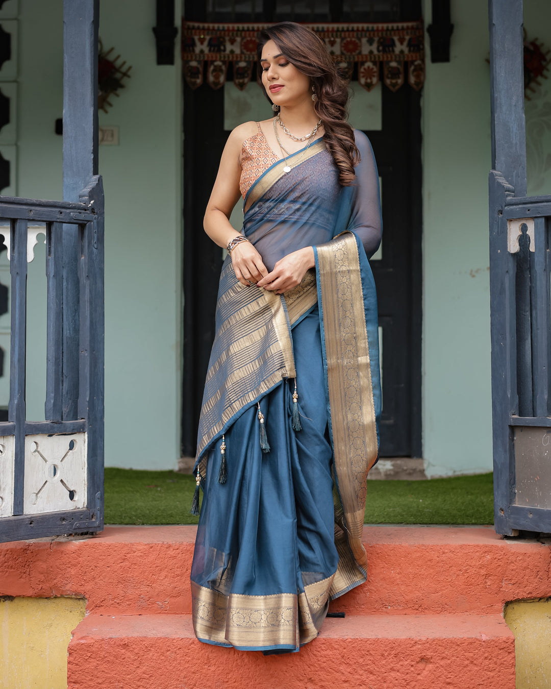 Teal Blue Plain Chiffon Saree with Gold Zari Border, Geometric Printed Blouse & Tassel Detailing