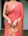 Graceful Coral Pink Plain Chiffon Saree with Gold Zari Border, Floral Embroidered Blouse & Tassel Detailing