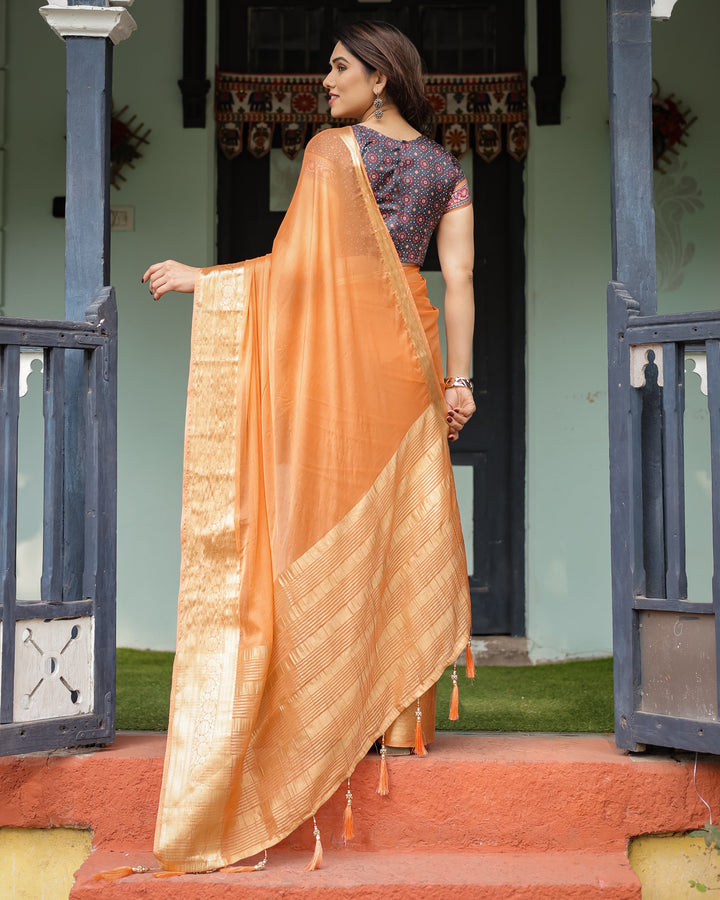 Elegant Tangerine Orange Plain Chiffon Saree with Gold Zari Border, Geometric Printed Blouse & Tassel Detailing