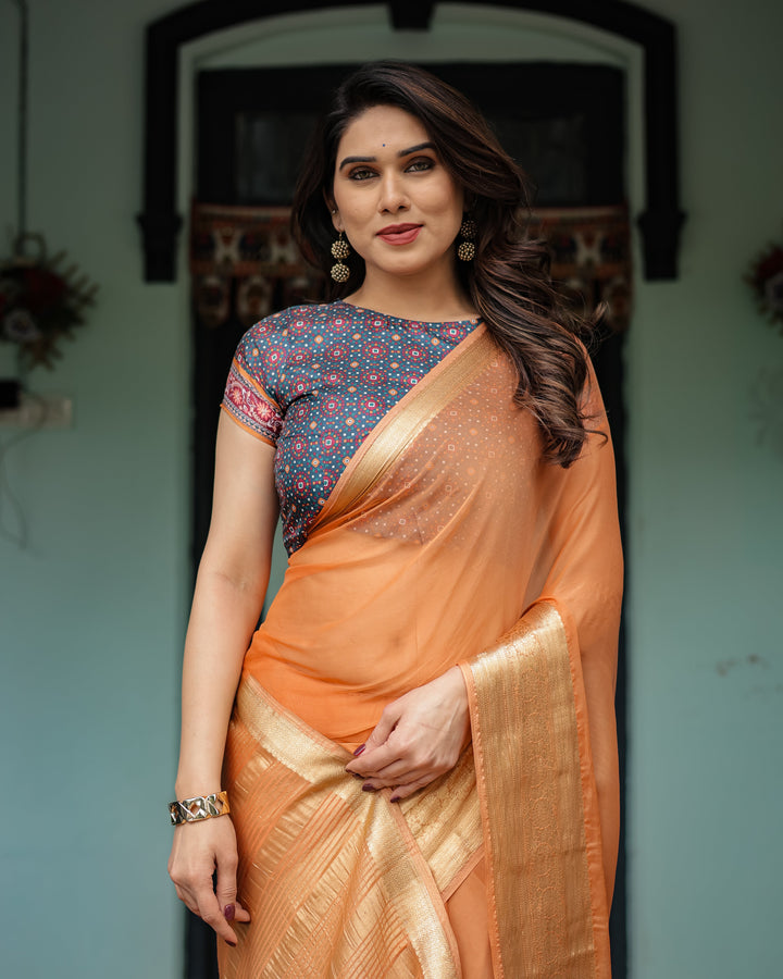 Elegant Tangerine Orange Plain Chiffon Saree with Gold Zari Border, Geometric Printed Blouse & Tassel Detailing