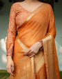 Sunset Orange Plain Chiffon Saree with Gold Zari Border, Floral Embroidered Blouse & Tassel Detailing