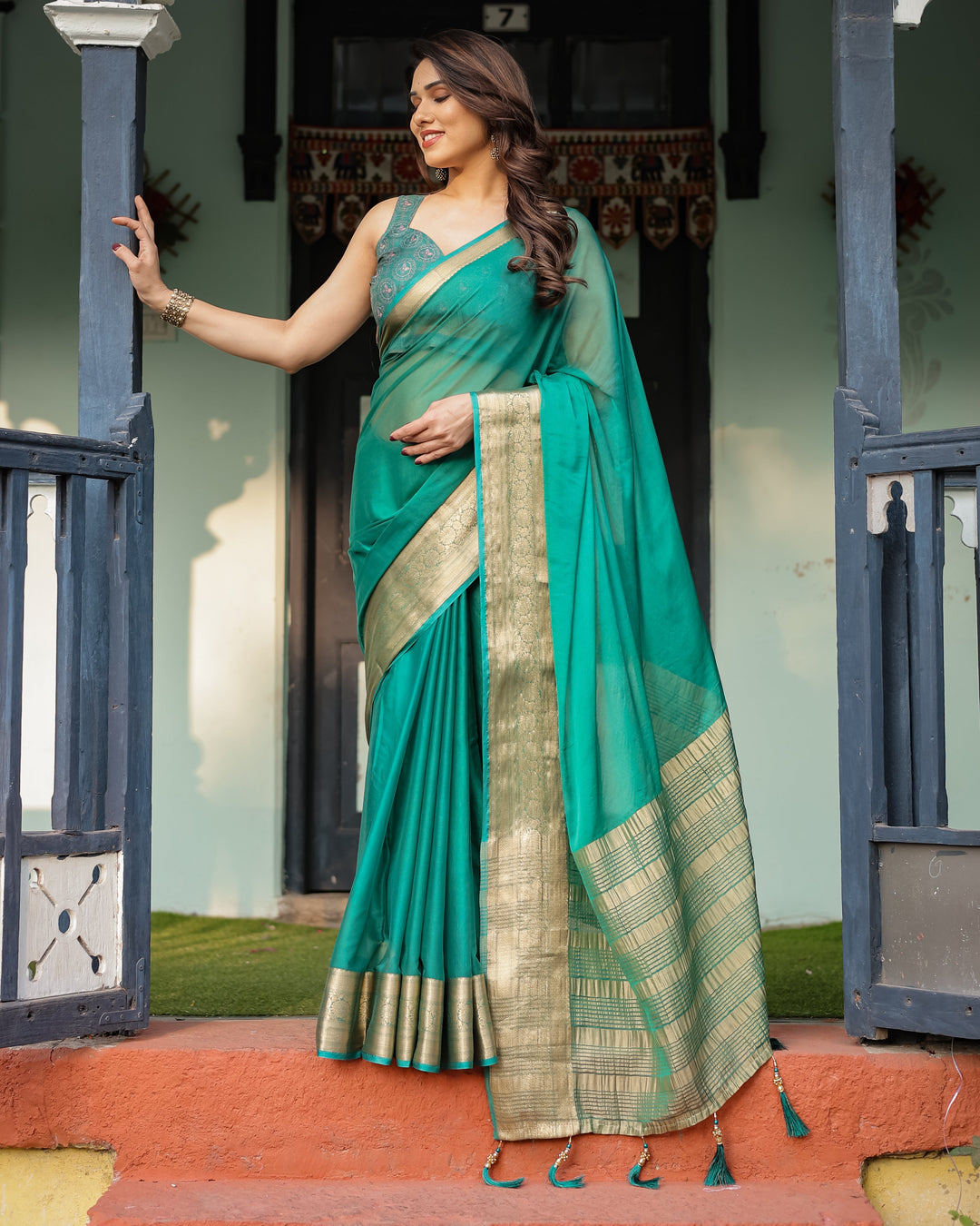 Elegant Sea Green Plain Chiffon Saree with Gold Zari Border, Paisley Printed Blouse & Tassel Detailing