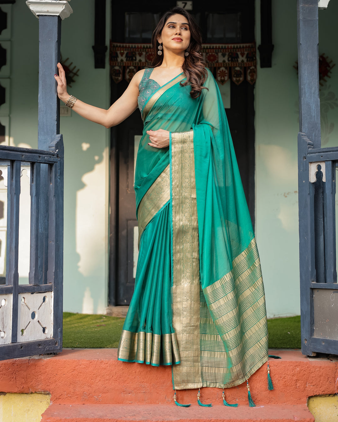 Elegant Sea Green Plain Chiffon Saree with Gold Zari Border, Paisley Printed Blouse & Tassel Detailing