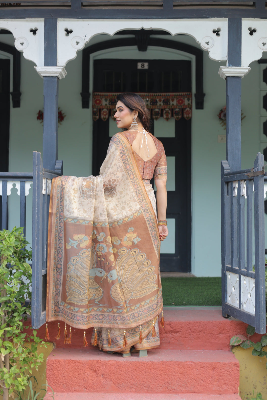 Beige and Rust Handloom Cotton-Linen Saree with Floral Motifs and Peacock Pallu