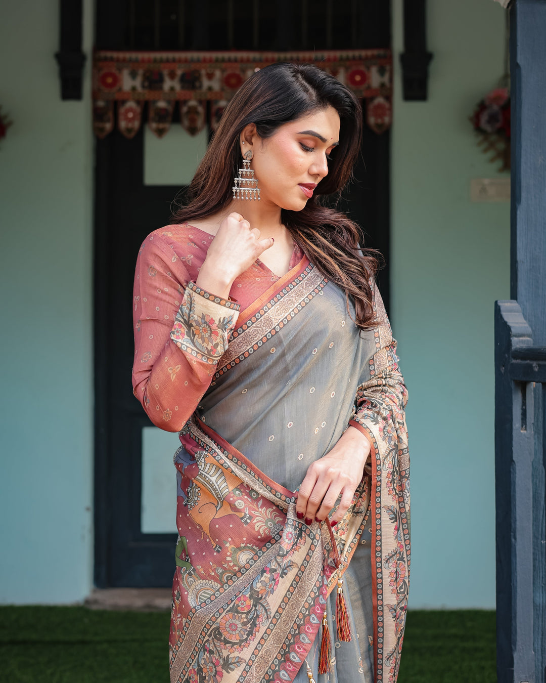 Slate Blue Handloom Cotton-Linen Saree with Vibrant Folk Motifs and Floral Pallu