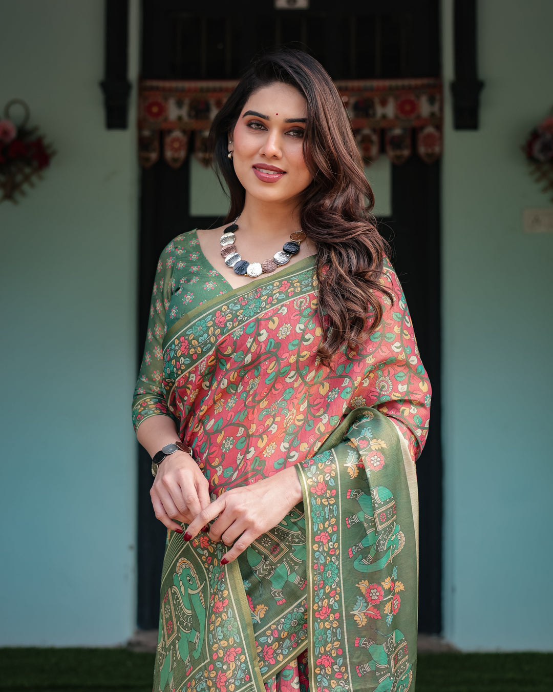 Green and Red Handloom Cotton-Linen Saree with Elephant Motifs and Floral Detailing