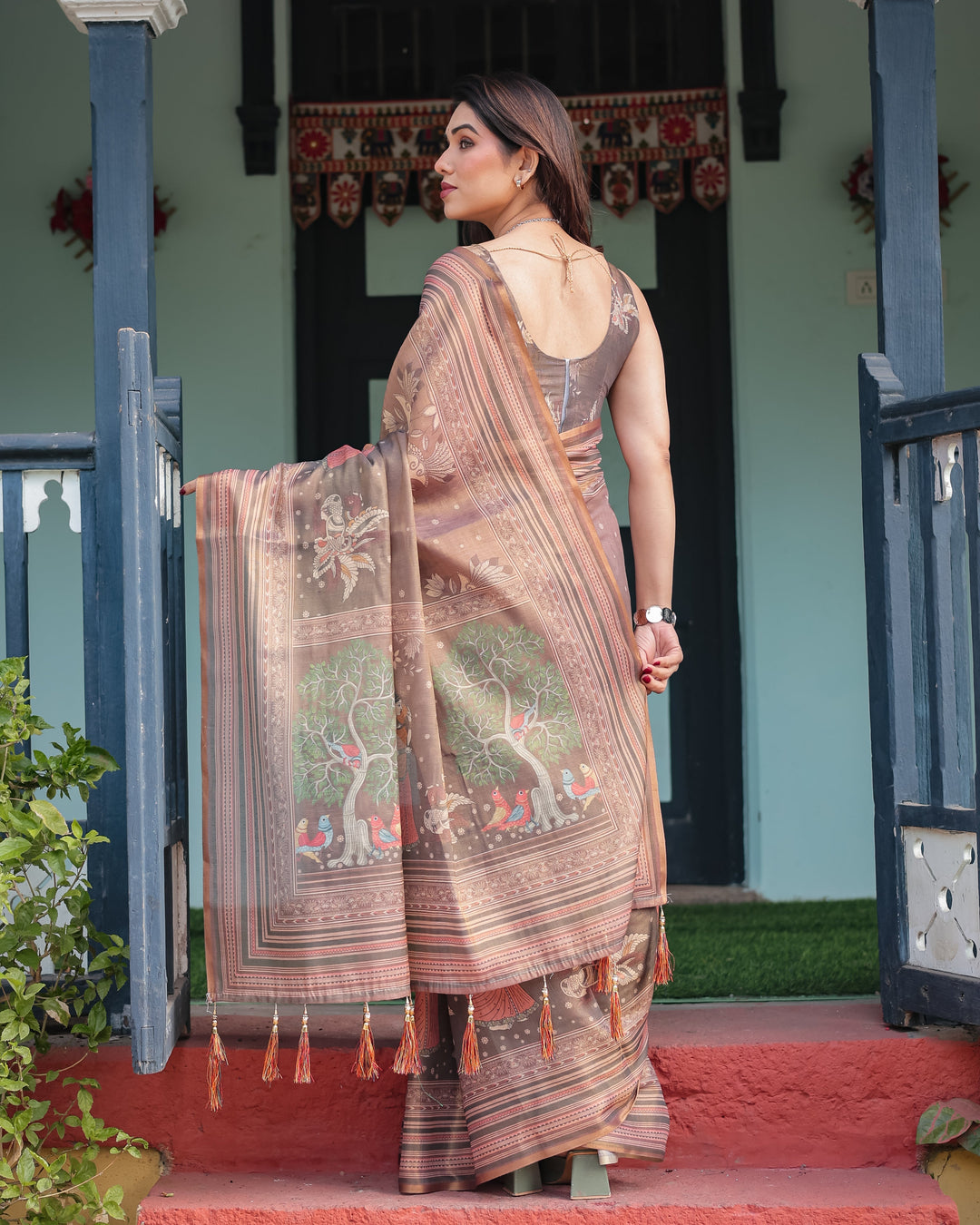 Earthy Brown Handloom Cotton-Linen Saree with Bird Motifs and Striped Detailing