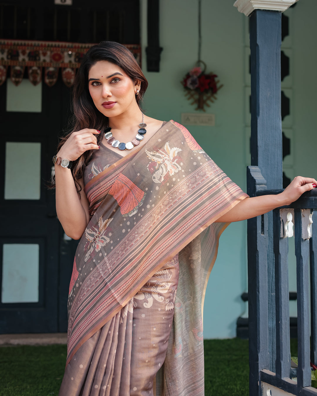 Earthy Brown Handloom Cotton-Linen Saree with Bird Motifs and Striped Detailing