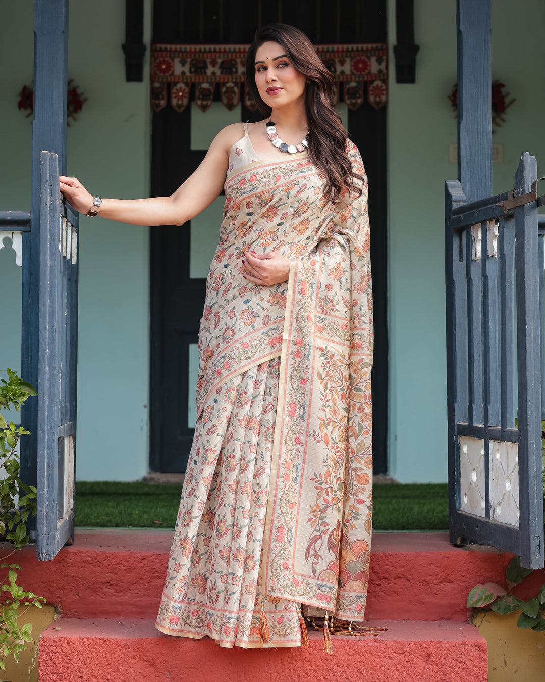 Elegant Beige Handloom Cotton-Linen Saree with Golden Zari Weave, Floral Printed Pallu & Tassel Detailing