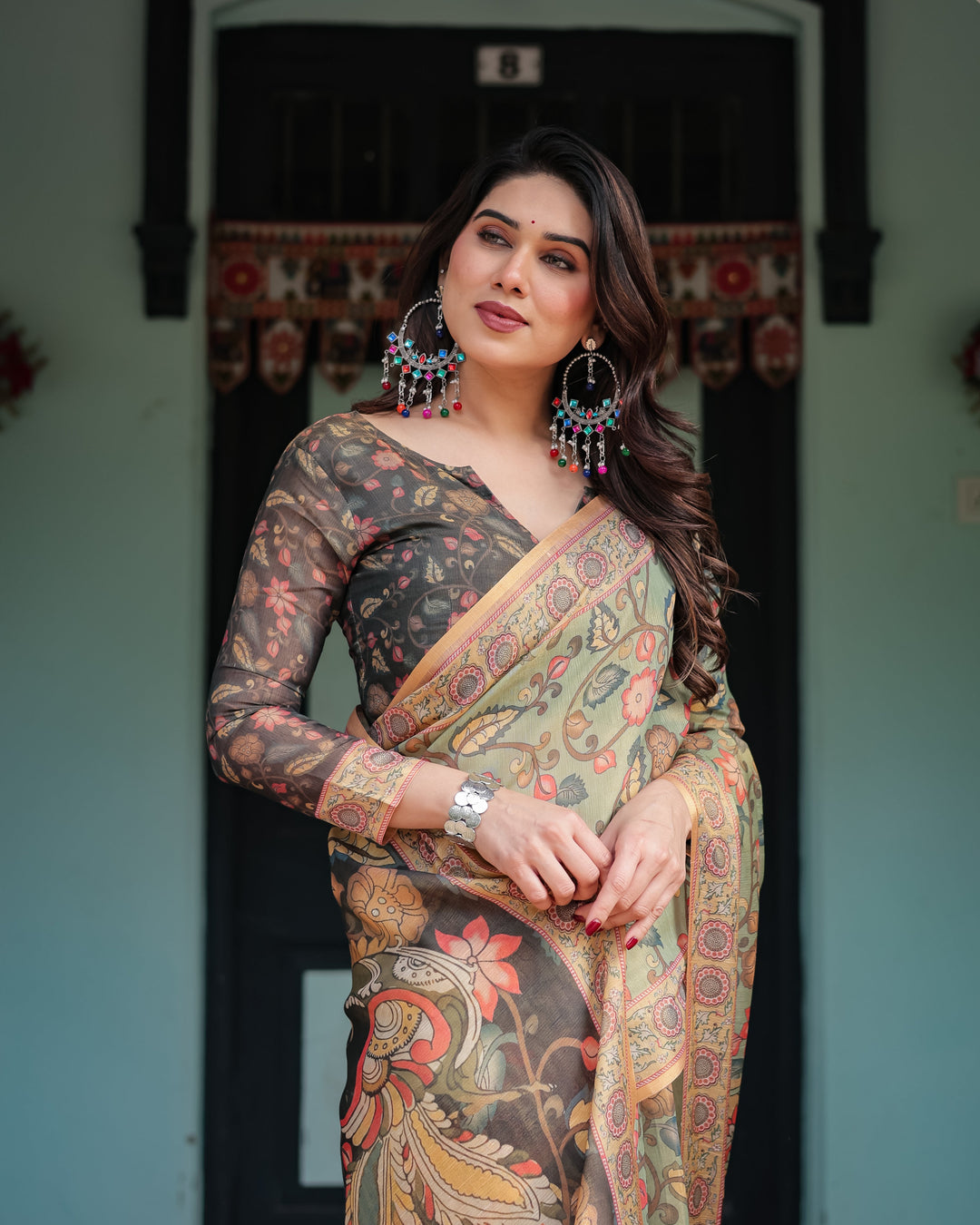 Sage Green with Bold Floral Motifs Linen Cotton Handloom Printed Saree, Vibrant Peacock Pallu, and Tassels