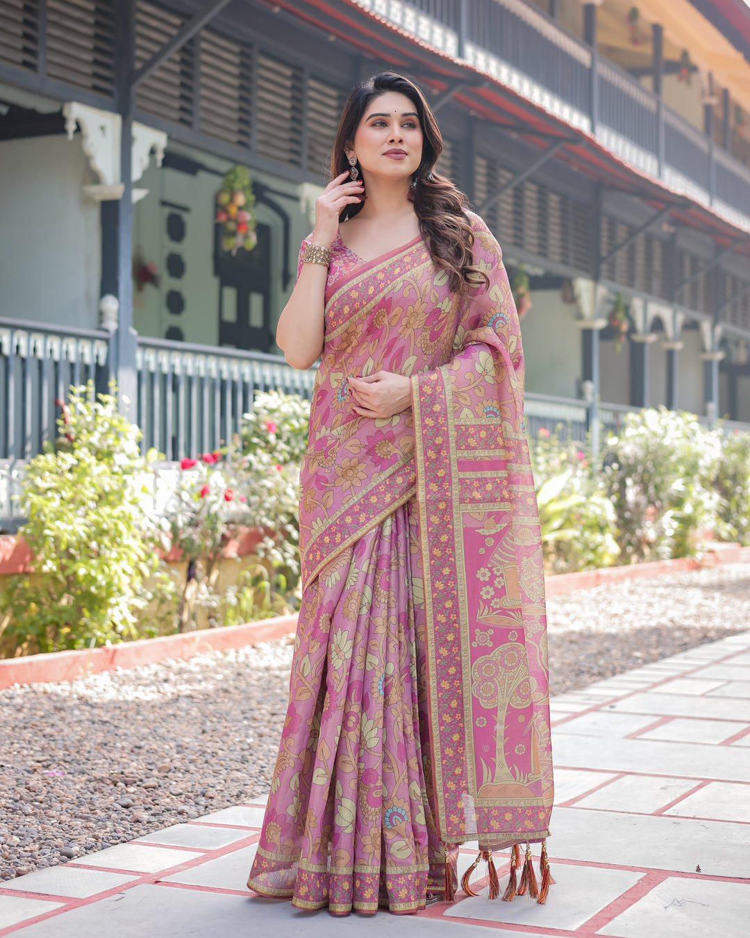 Regal Pink Handloom Cotton-Linen Saree with Floral Motifs, Golden Zari Highlights, and Tassel Detailing