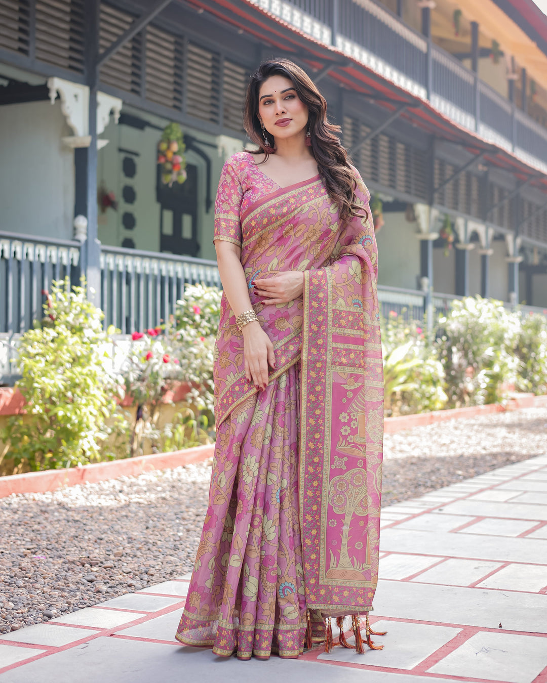 Regal Pink Handloom Cotton-Linen Saree with Floral Motifs, Golden Zari Highlights, and Tassel Detailing