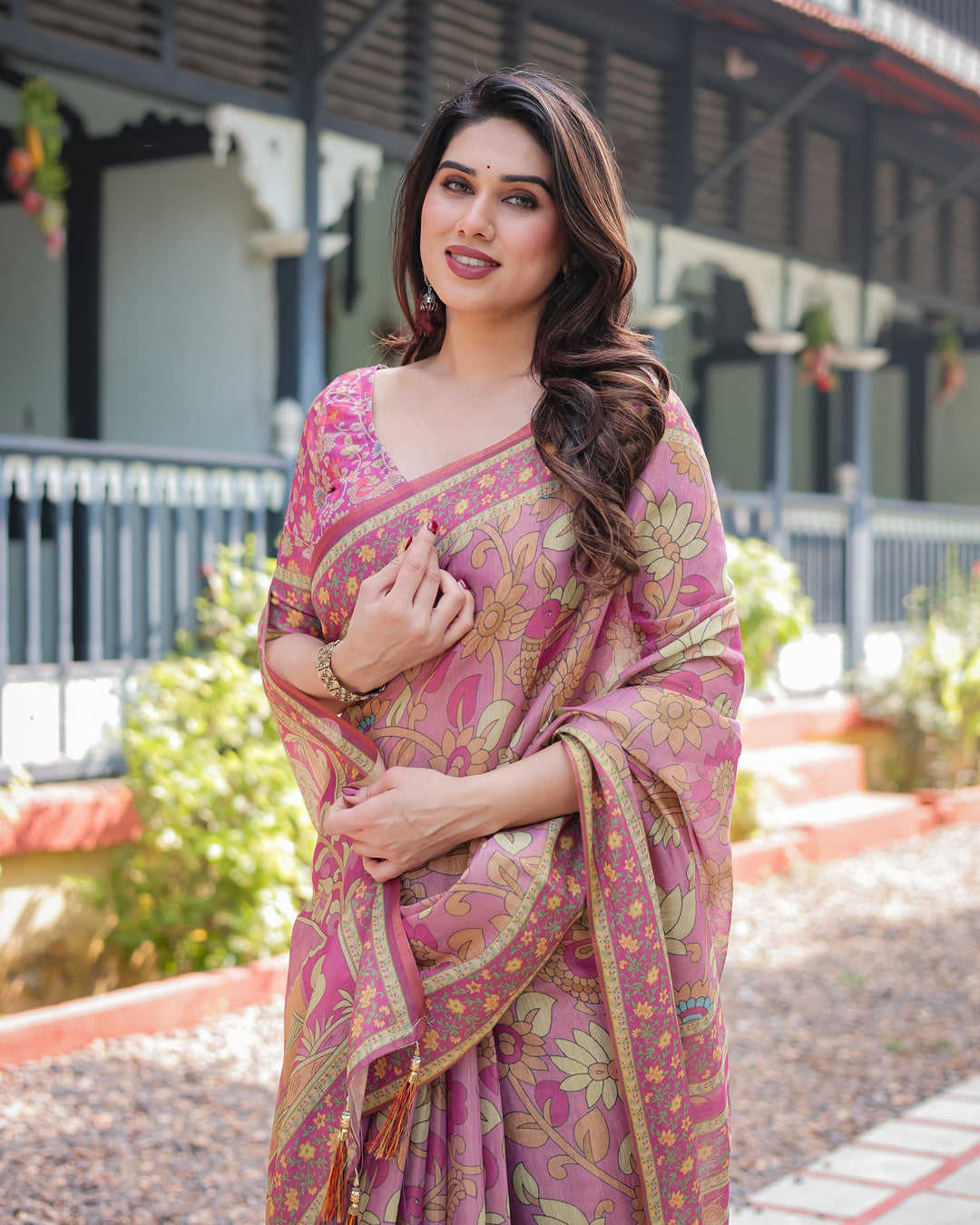 Regal Pink Handloom Cotton-Linen Saree with Floral Motifs, Golden Zari Highlights, and Tassel Detailing