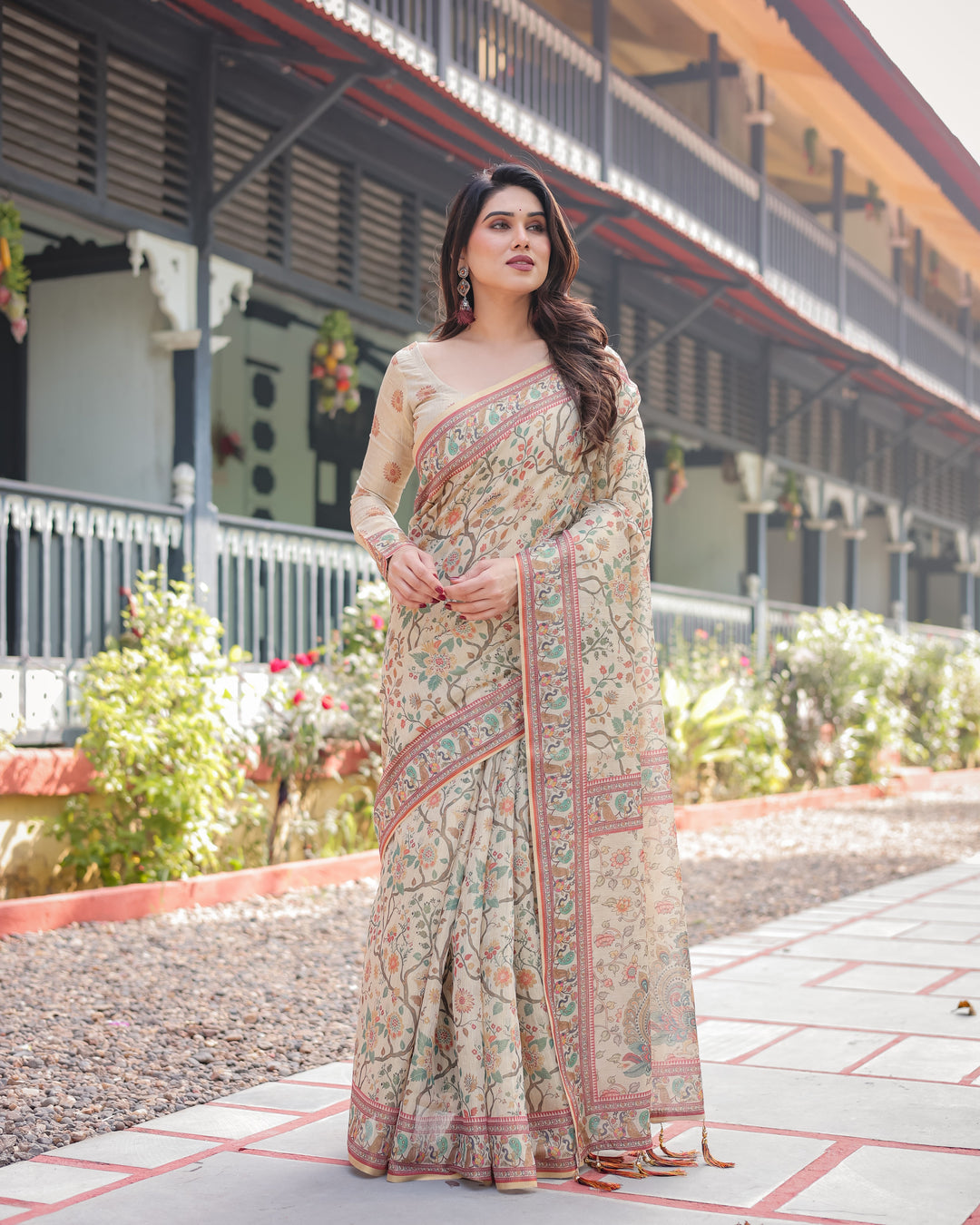 Ivory Handloom Cotton-Linen Saree with Floral and Peacock Motifs, Zari Highlights, and Tassel Finish