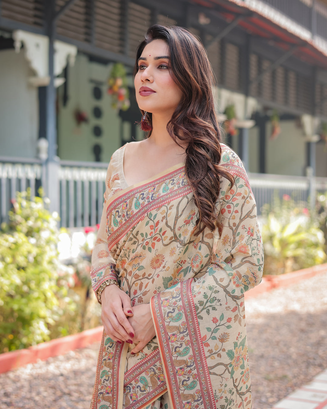 Ivory Handloom Cotton-Linen Saree with Floral and Peacock Motifs, Zari Highlights, and Tassel Finish