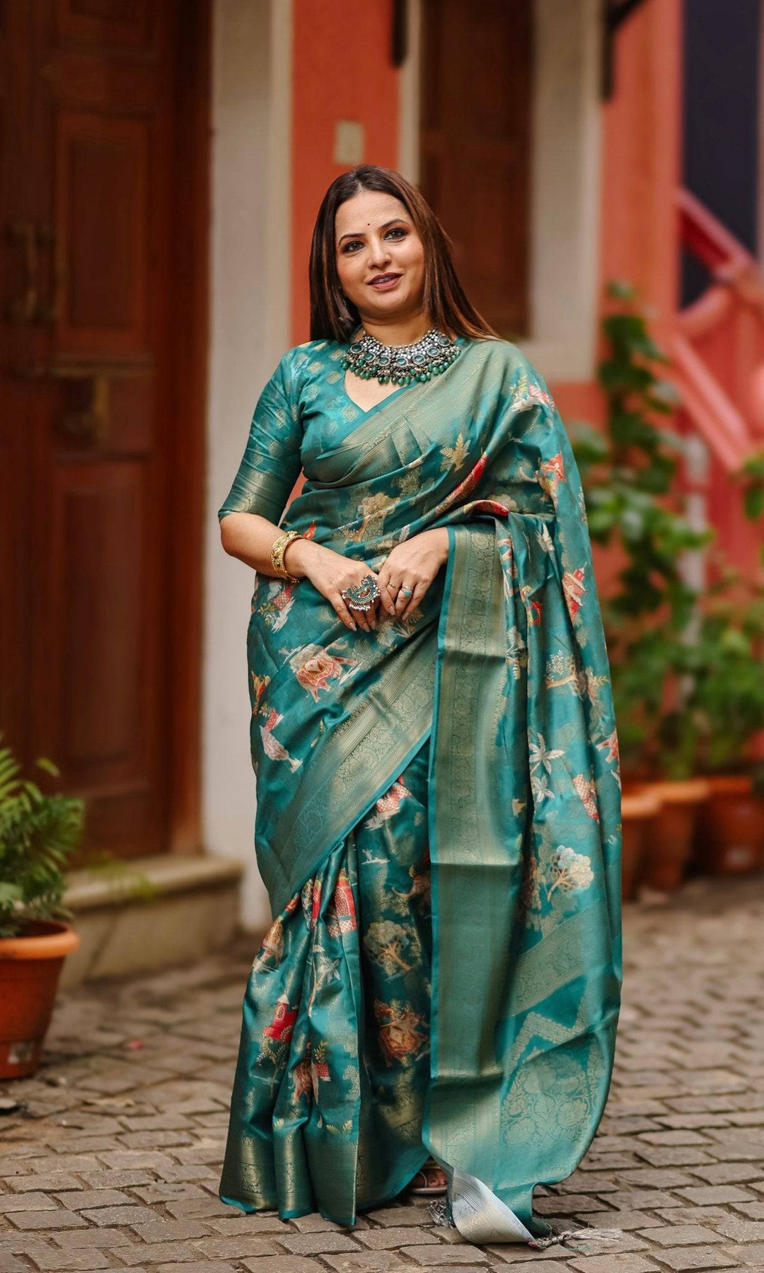 Teal Banarasi Silk Saree with Zari Weave Border & Intricate Traditional Motifs